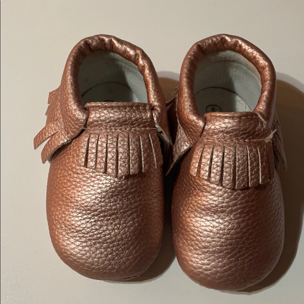 Rose gold baby moccasins
